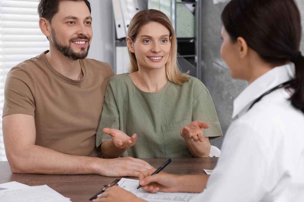 couple asking doctor how long an IVF cycle takes