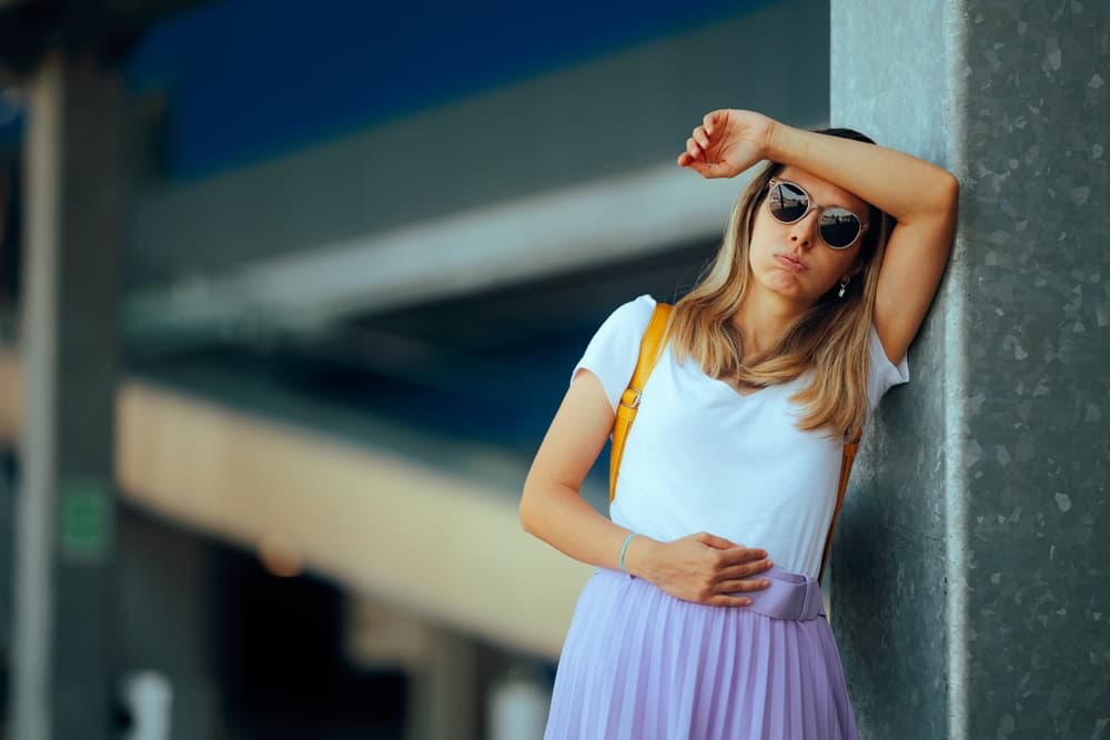 woman dealing with bloating side effect of IVF in Virginia